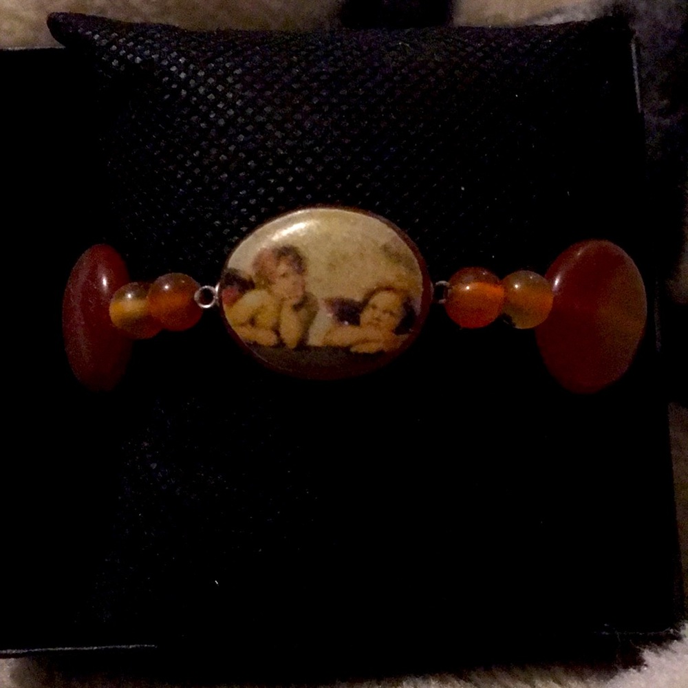 Carnelian and artisan crafted bracelet